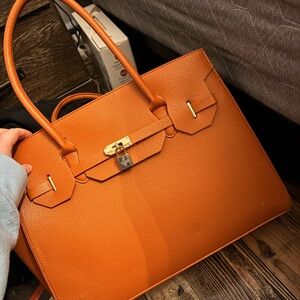 Elegant Orange Leather Handbag